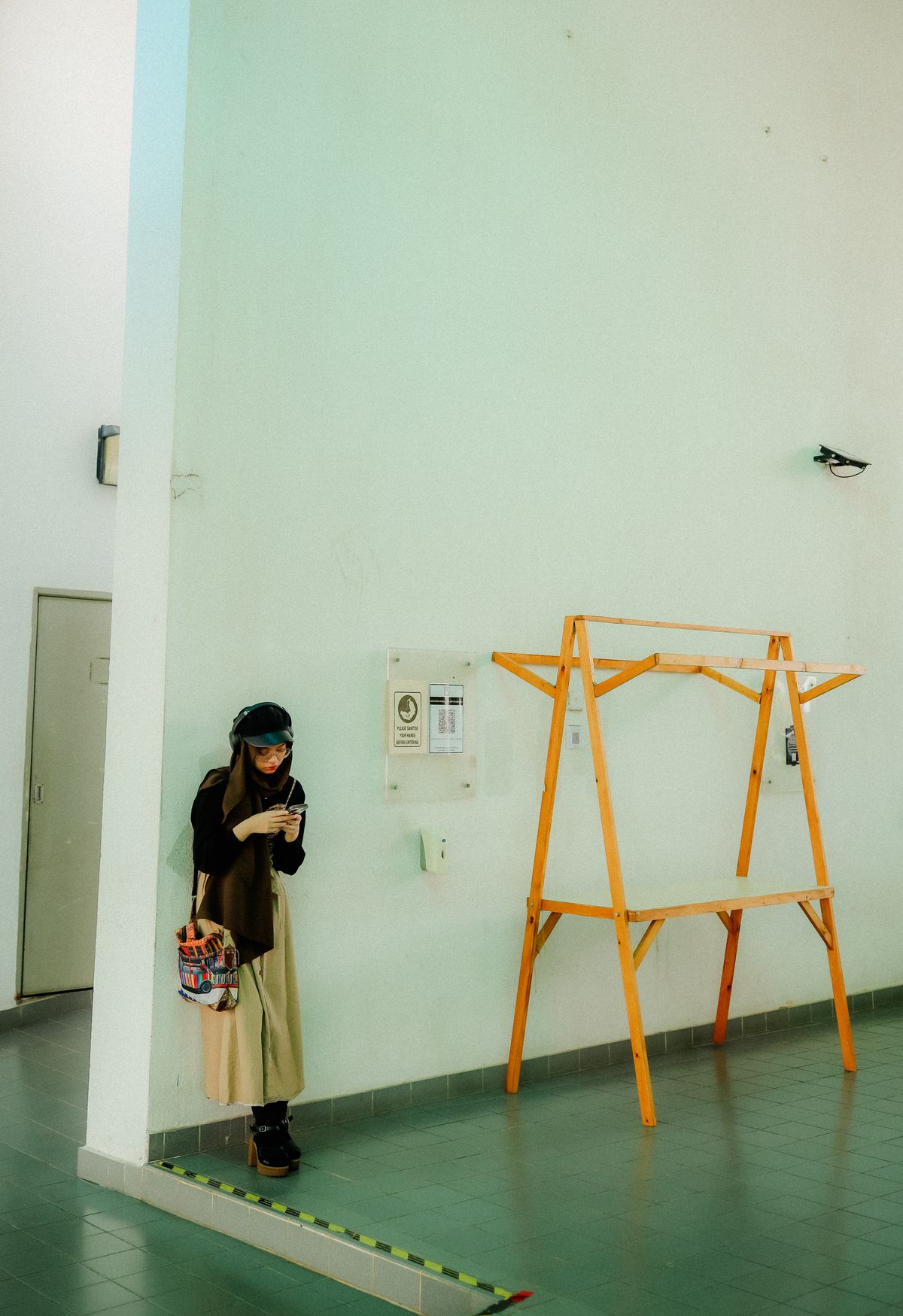 A woman using a smartphone in Cyberjaya