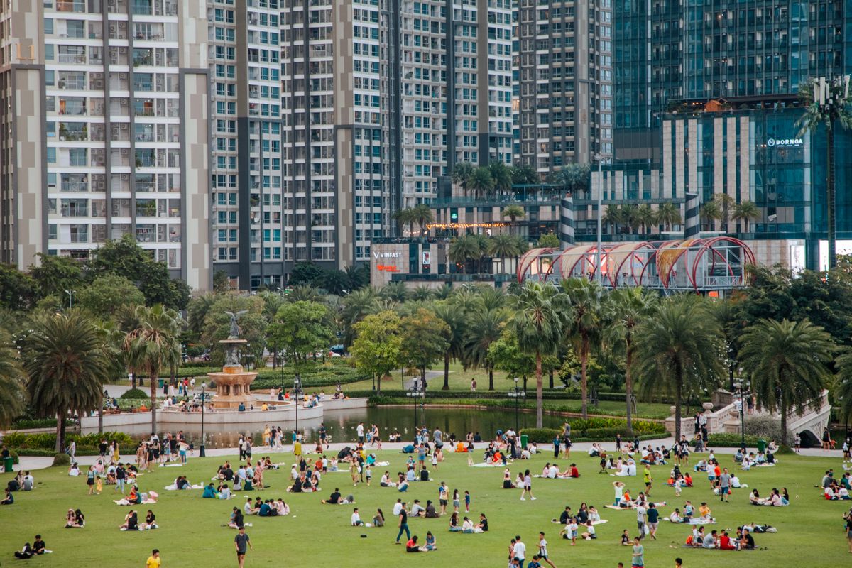 People relaxing at KLCC Park in Kuala Lumpur