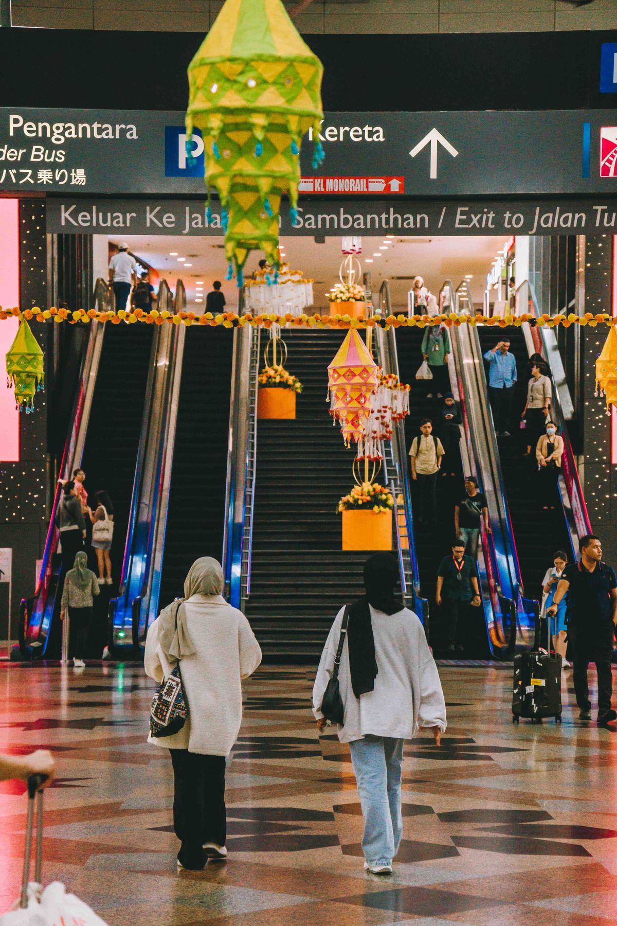 People walking through a Kuala Lumpur shopping centre